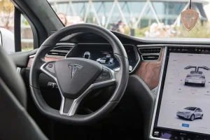 Modern connected electric vehicle dashboard showing digital software interface