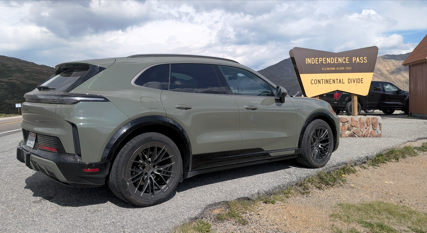 Porsche Cayenne Turbo Electric driving on a mountain road
