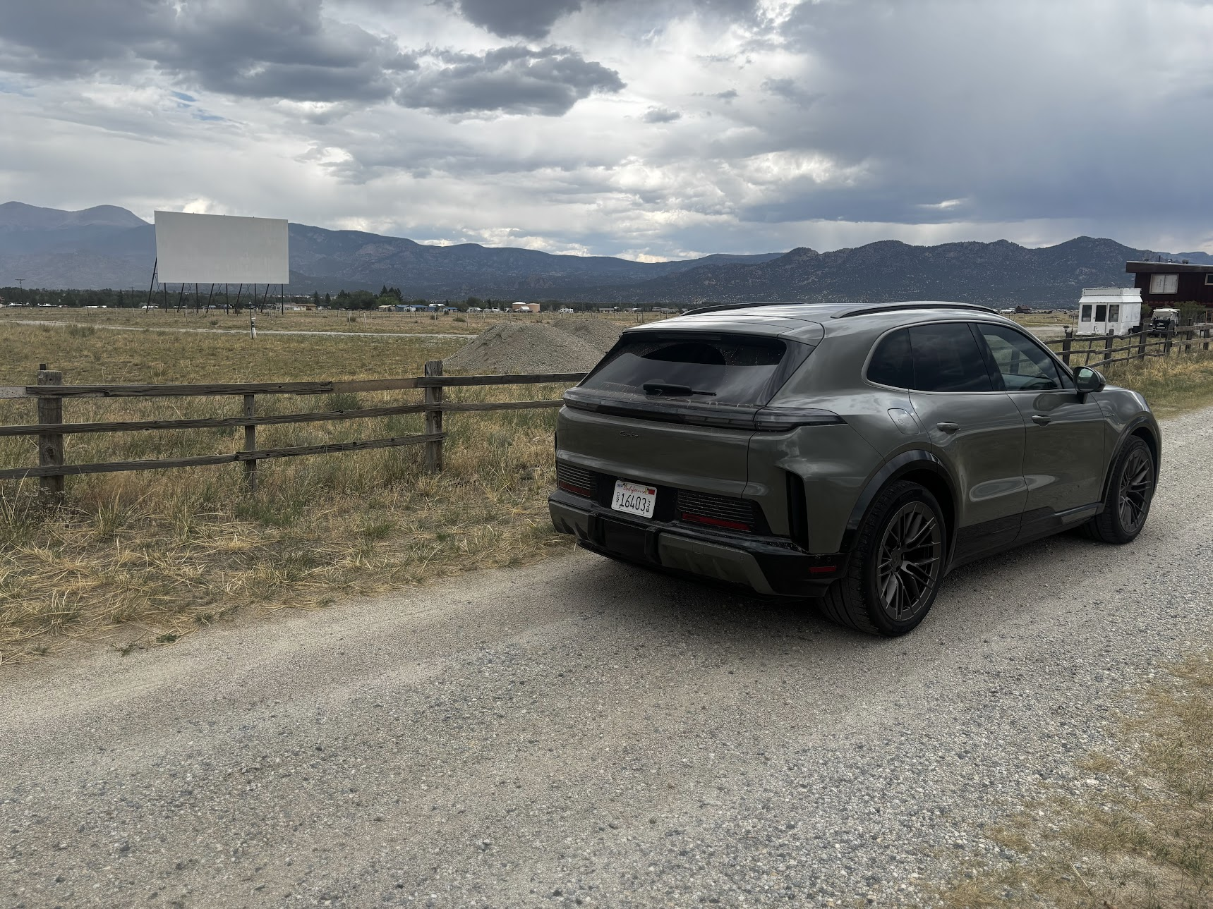 Porsche Cayenne Turbo Electric driving on a mountain road