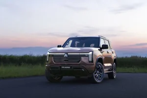 The 2027 Mitsubishi Pajero parked on a trail showcasing its boxy design