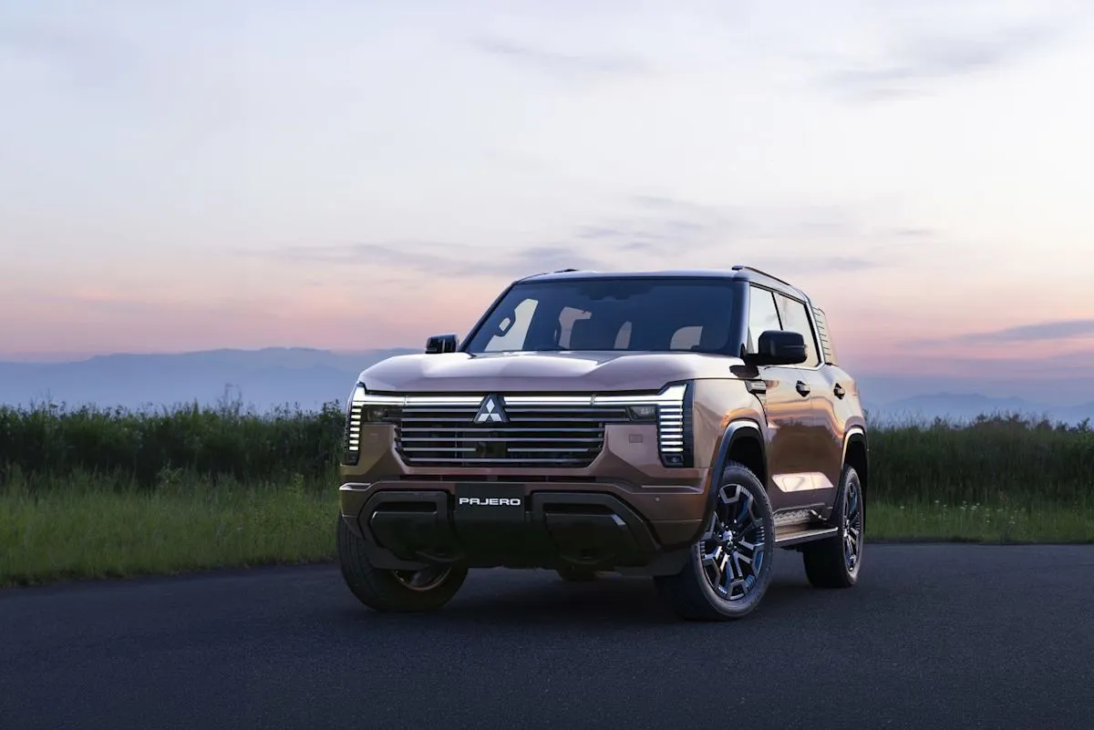 The 2027 Mitsubishi Pajero parked on a trail showcasing its boxy design