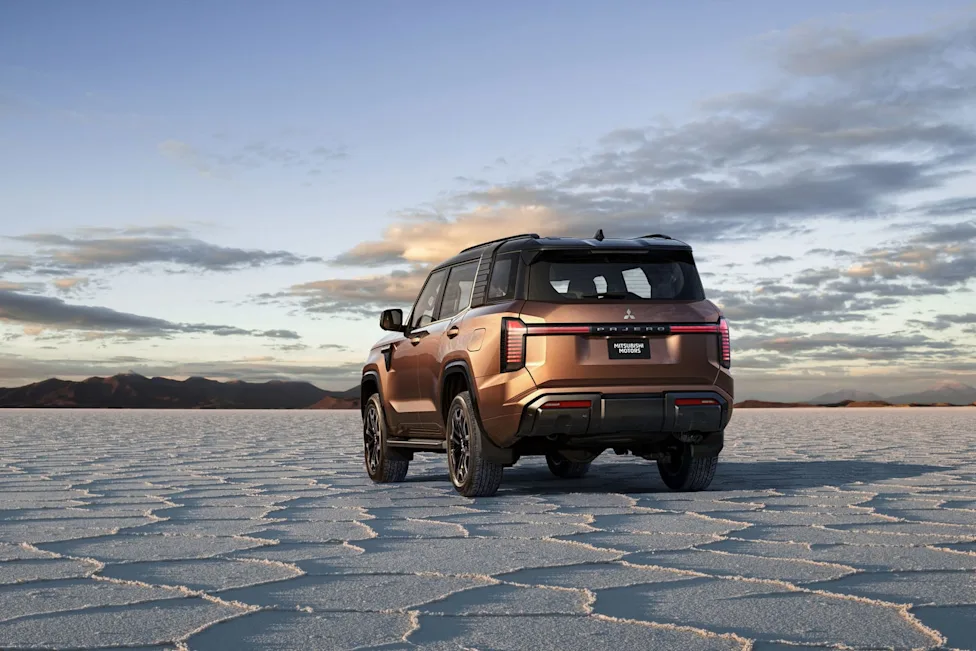 The 2027 Mitsubishi Pajero parked on a trail showcasing its boxy design