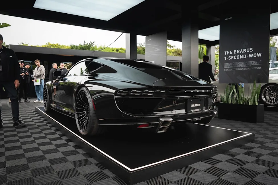 The elegant side profile of the Brabus Bodo Coupe showing its long hood and carbon fiber bodywork.