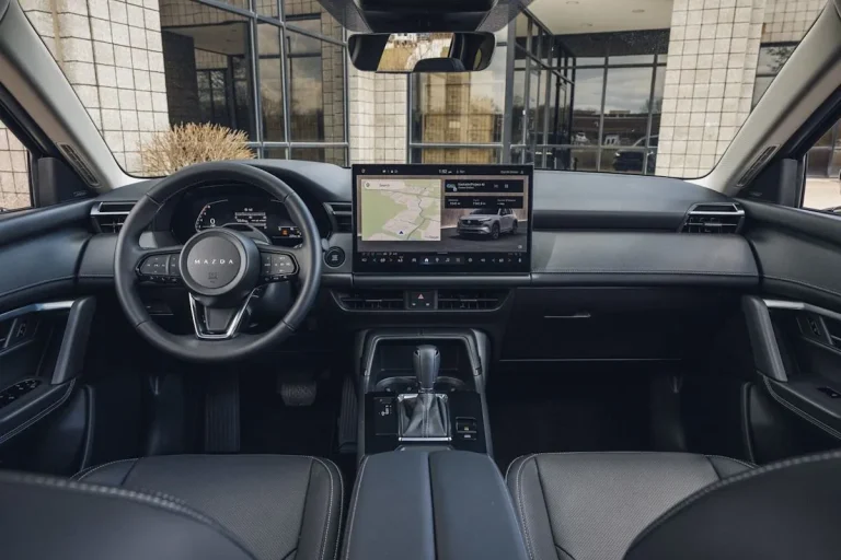 The modern dashboard and refined interior layout of the 2026 Mazda CX-5 Premium Plus