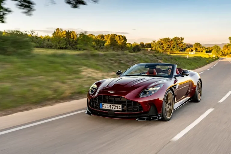 The sleek exterior of the 2027 Aston Martin DB12 S Volante convertible showcasing its aggressive front splitter and hood