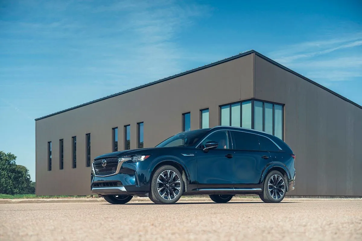 A side view of the premium Mazda CX-90 three-row SUV