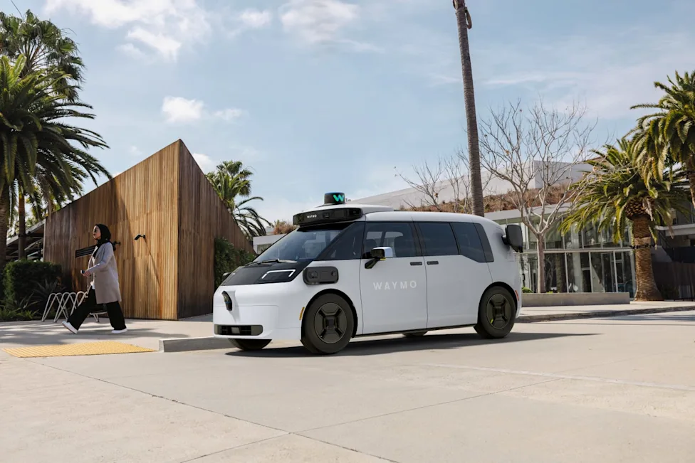 An operator monitoring autonomous vehicles from a remote workstation computer screen