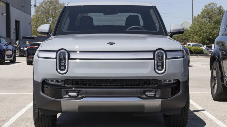 Comparison of high-performance electric pickup trucks against the Nissan GT-R
